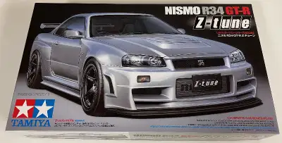 brand new Tamiya 1/24 Nissan Skyline GT-R R34 Z-tune model. Item is still sealed inside and never op...