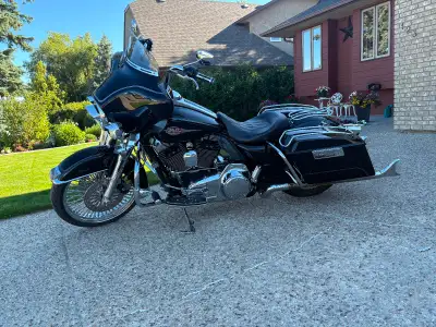 2009 Ultra Classic in excellent condition, aftermarket spoke wheels, seat,14” bars for comfortable r...