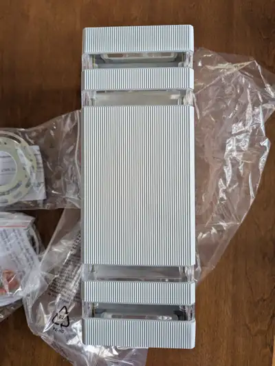 Two white aluminum outdoor LED wall lights. Brand New., View more