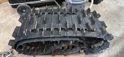 I am selling a Yamaha snowmobile track with dimensions 144x15x2 inches and a 2.52 pitch. This track...