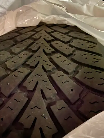 Set of 4 tires for $75. Good for another winter before retiring the tires. NOT on rims. Clearing sto...