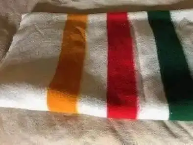 Vintage blanket with orange-red-green stripes $65, View more