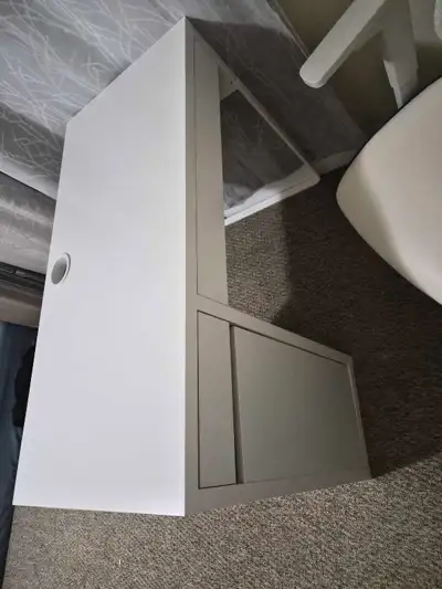 Upgrade your workspace with this well-maintained IKEA Micke desk paired with a supportive, high-back...