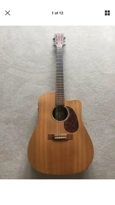 MARTIN ELEC. ACOU. GUITAR, View more