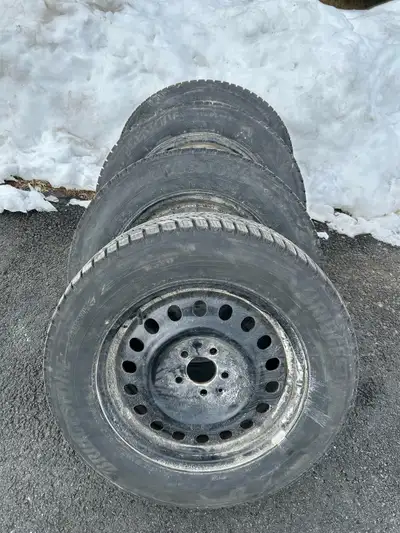 Bridgestone blizzak winter tires on rims. Only used for 1.5 seasons. Tires came off a Mazda CX-50. C...