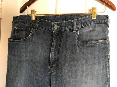 Very clean, rarely worn soft textured blue jeans in very good condition. Straight Leg. Length is 32...