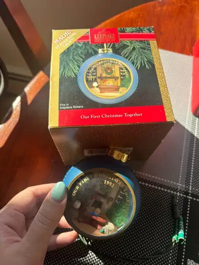 Hallmark ornament “Our first Christmas together” 1992- Flickering fireplace when plugged in. In good...