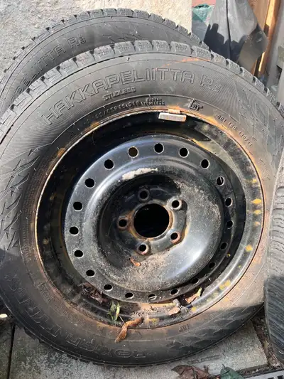 Full set of steel rim winter tires assembled and brand new tires and rims, mild rust residue but zer...