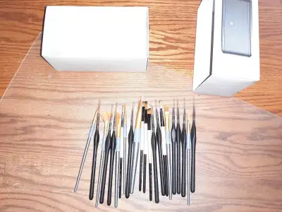 Paint brushes used sparingly. cash only or paypal