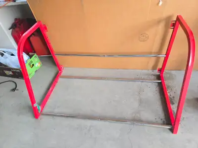 Heavy Duty 4-tire Storage Rack Industrial/ well made/ adjustable Red color- hardware included Max lo...