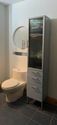 Unique bathroom furniture - cabinets, mirror and light fixture