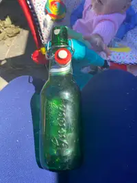 Grolsh green bottles
