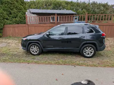 Black Jeep Cherokee, no rust. Clean car. Automatic.