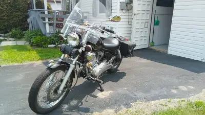 Very clean, windshield, led headlight & taillights, saddle bags, sprocket change for better highway...