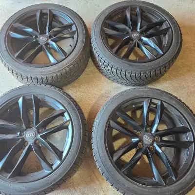 selling four18 inch Michelin winter tires with alloy rims for $1250 95% of tread remaining. tire siz...