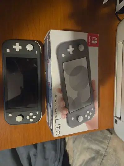 selling switch lite grey - open box, View more
