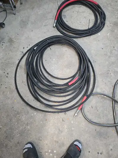 Pressure washer hose with quick connect ends. They are in good condition and ready to get to work! I...