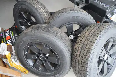 4 winter Michelin X-ice tires mounted on alloy rims tire size P245/70 R17 -rims will fit GM products...