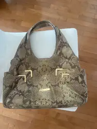 Michael kors snake skin purse with gold accents