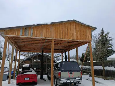 20x24 car port 2 years old with steel roof and engineered trusses 6x6 posts needs dismantling by new...
