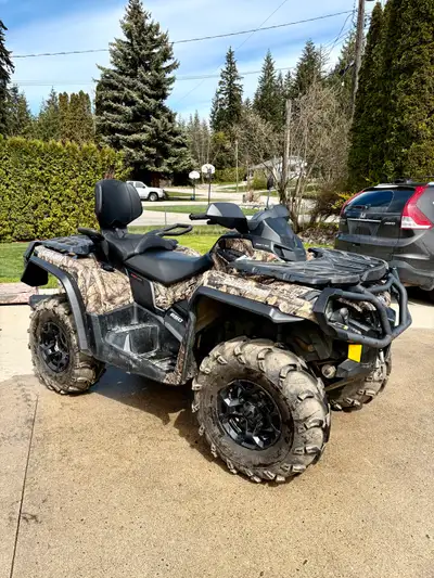 Atv comes with front & rear bags. Both bags have mud covers. The rear bag fits without removing the...