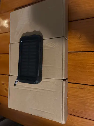 Brand new Portable charger with solar panel charging, View more