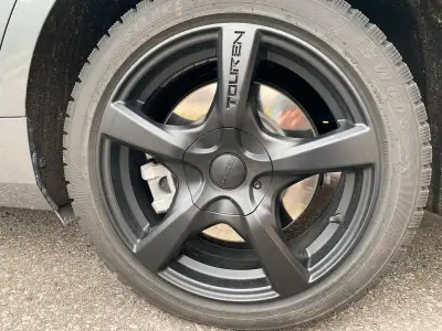 I'm selling a set of four used Touren wheels with winter tires.These rims are 17 inches and have a 5...
