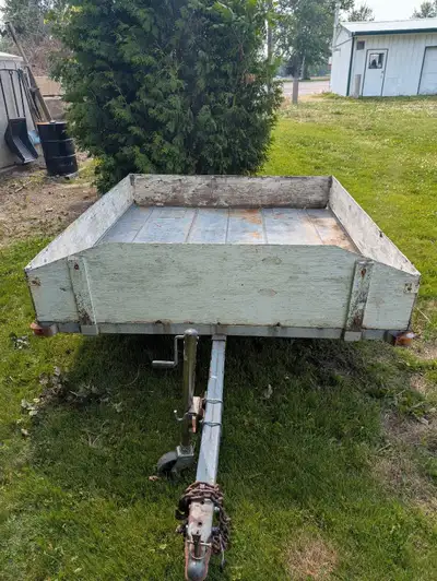 Galvanized Snowmobile Utility trailer. Tilt deck. Removable Sides. New Leaf Springs. New lights. Loc...