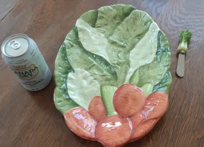 This 14 x 9.5" platter is in new giftable condition. No cracks or chips. It is labelled made in Mexi...
