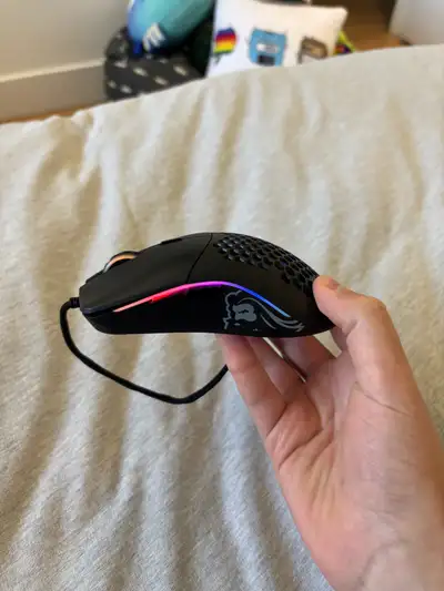 Brand new Glorious Model O gaming mouse (Matte Black). Ultra-lightweight 67g honeycomb design built...