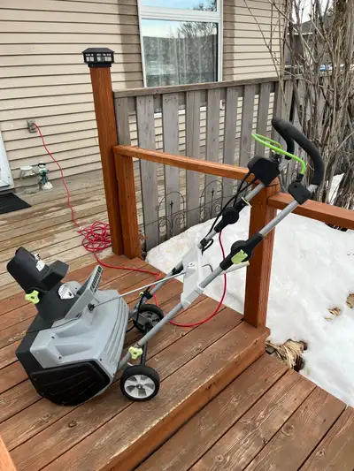 Electric snowblower works well, folds for storage.