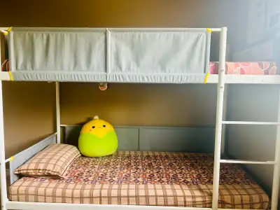 This is an IKEA bunk bed frame, perfect for kids or guest rooms where space is at a premium. It's in...