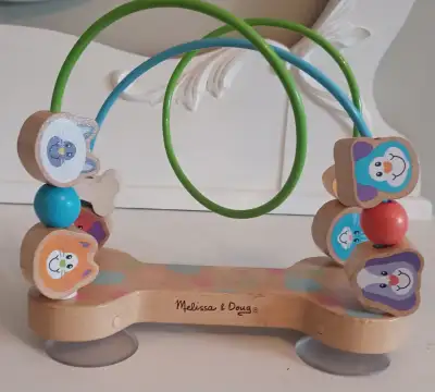 This Melissa & Doug, First Play, Pets, Wooden Bead Maze with suction cups is for babies and toddlers...