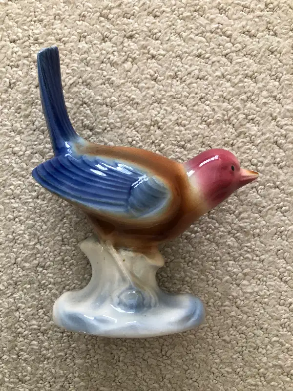 Porcelain bird figurine64595457918851122