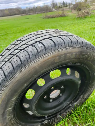 4 Uniroyal Tiger Paw Touring Tires 205 60 R16 on Black Steel rims ,Balanced.$300.Fit Mazda 3