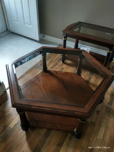 Glass top hexagon coffee table 3 feet wide ,17 1/2 inches high Few small marks on the glass top and...