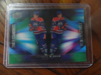 Trade 3 D Mcdavid for two 3 D cards i need 4 - 7pick up only