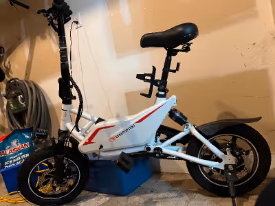 E-Bike almost new and Charger Text me