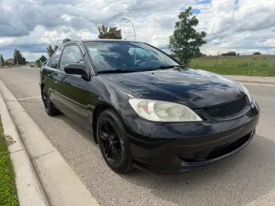 Reliable black 2004 Honda Civic SE coupe. Driven daily as commuter to work, however vehicle is not l...