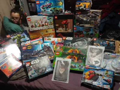 Whole bunch of brand new Lego sets and over the Lego sets that have been unbuilt 21 set of Lego and...