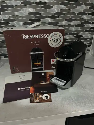 Hello! I am selling a brand new, never used Nespresso Original Pixie. I received as a wedding gift b...