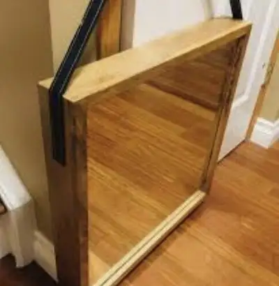 Hang with leather strap or with hooks in the back Dimensions 22inches x 22 inches of outer frame.