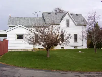 Two story farm house with basement for rent near Smithville. Clean, large yard, carport, garage. Two...