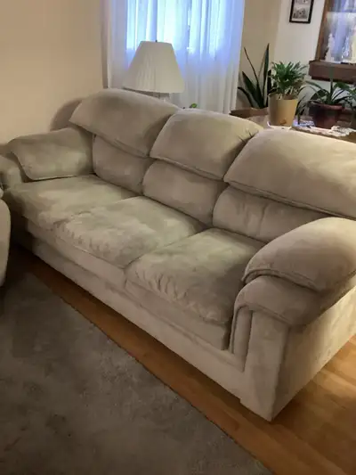 Clean sofa no pets must sell,please phone 306 382 4249 . Cream colour in good shape.