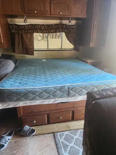 Excellent condition. 2012. Used only one or two weeks per year. Slide out. Lots of storage. Sleeps 4...