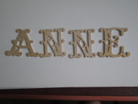 wooden letters (ANNE) for crafting