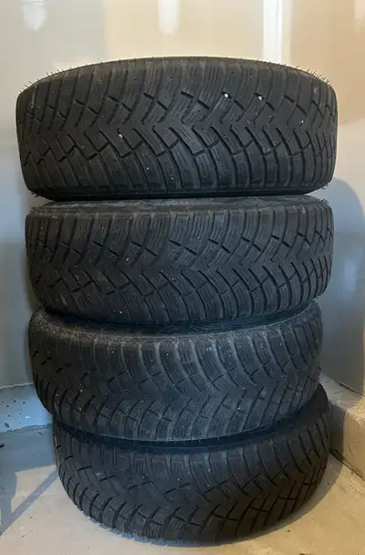 Four NEXEN WinGuard WinSpike winter tires on steel rims. Tires are in excellent condition - only use...