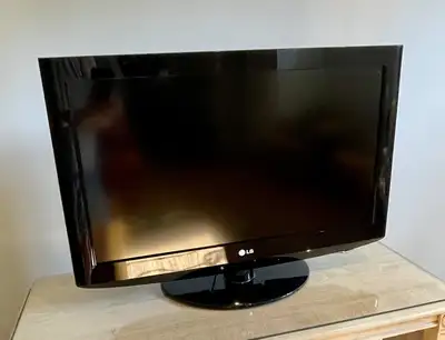 32" LG TV (Model 32LH20) – Works Perfectly with Remote & Stand, View more