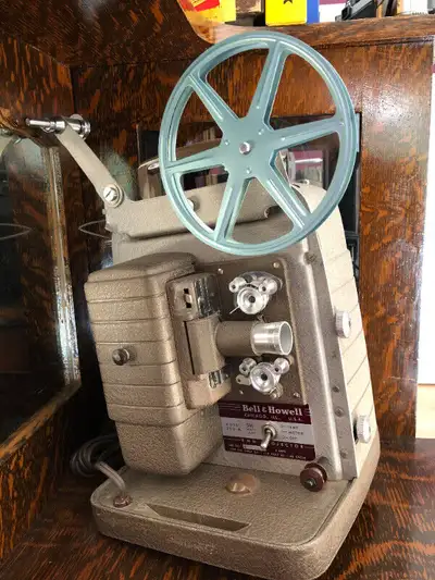 Bell & Howell 8 mm Movie Projector Model 253-A, View more