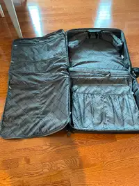 Tracker Suit/Garment Travel bag on wheels.
